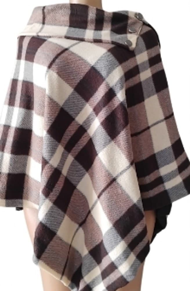Brown, grey and cream checked woollen poncho with buttoned collar on a mannequin